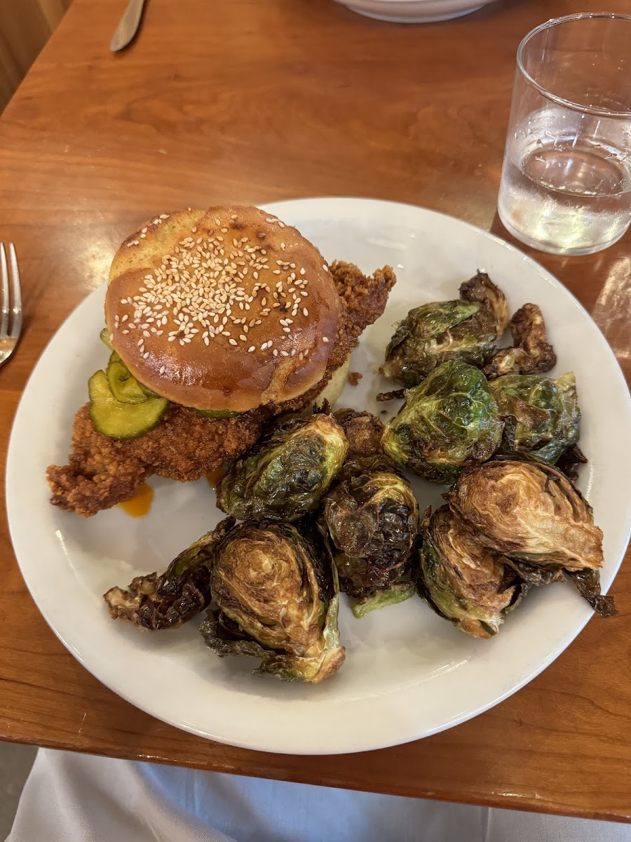 Nashville fried chicken sandwich with a side of brussel sprouts. So delicious and very crispy!