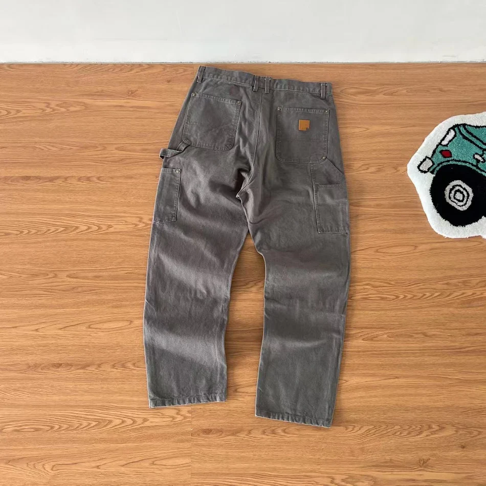 Calças cargo de lona multiuso americanas reforçadas para trabalho pesado, estilo casual. Perfeitas para atividades de corte de madeira e uso externo.