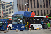 Metrobus coaches at Gandhi Square Precinct in the Johannesburg CBD.
