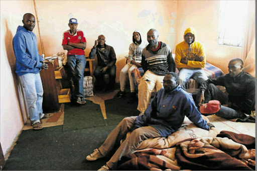 NO FOOD: A group of workers from Limpopo are stranded in Frankfort outside Bhisho, after their construction company boss left without paying them Picture: MICHAEL PINYANA