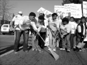 GIVE US LAND: Rawsonville women farmworkers occupied vacant land on a farm and planted seedlings. Pic. Anna Majavu. 10/08/08. © Sowetan.