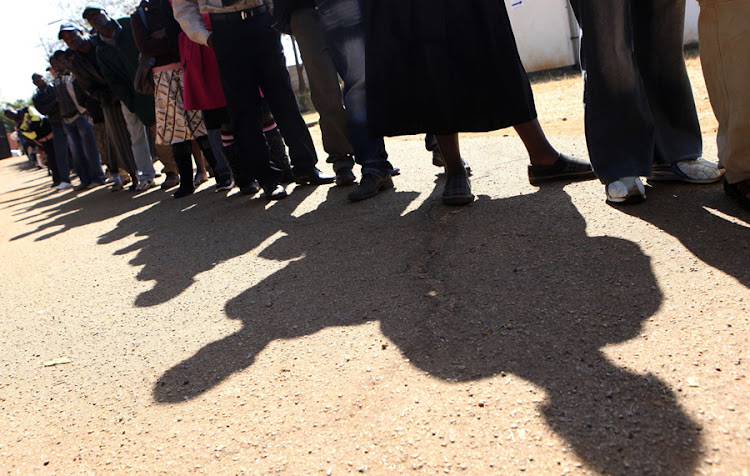 Zimbabweans arrive to cast their votes at a polling station in Harare. Picture: REUTERS