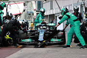 Valtteri Bottas of Finland makes a pitstop but his front right wheel is stuck on his car leading to his retirement from the race during the F1 Grand Prix of Monaco on May 23 2021.