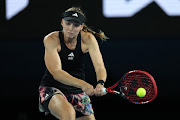 Elena Rybakina of Kazakhstan plays a backhand her semifinal against Victoria Azarenka on day 11 of the 2023 Australian Open at Melbourne Park on January 26 2023.