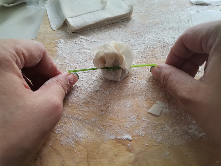 Fold the dumplings.