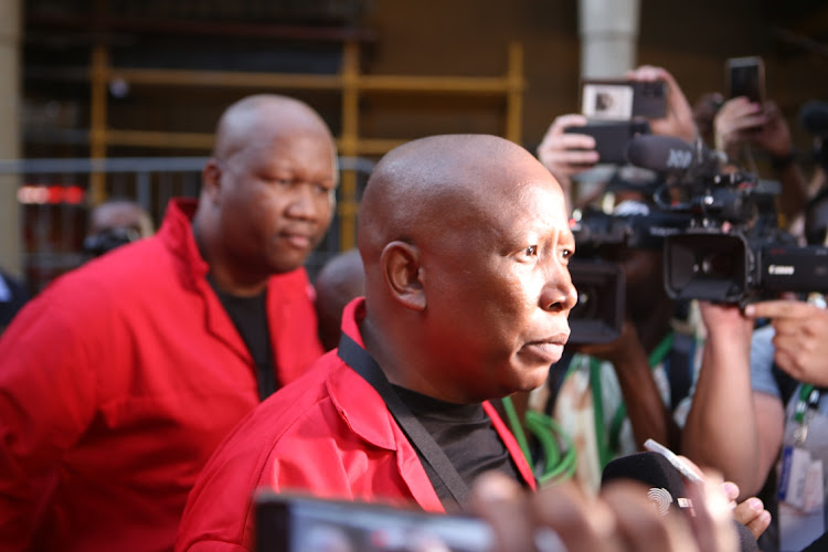 Julius Malema, the leader of EFF addresses the media after being removed from the 2023 State Of The Nation Address (SONA) in Parliament.