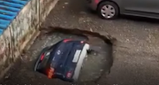 A vehicle was swallowed by an unused well in India.