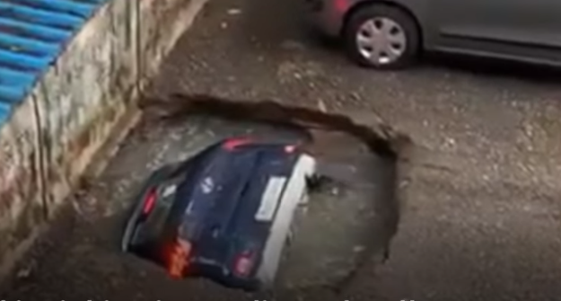 A vehicle was swallowed by an unused well in India.