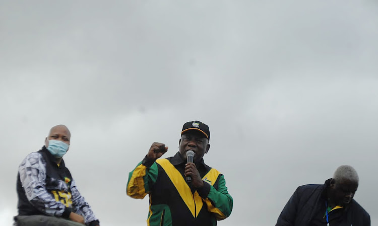 ANC president Cyril Ramaphosa addresses community members at Intabazwe Community Staduim in Maluti A Phofung in the Free State on Sunday.