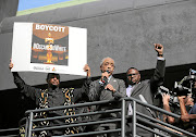 The Reverend Al Sharpton, right, speaks about the lack of diversity among the nominees at the 2016 Academy Awards at a rally before the awards.