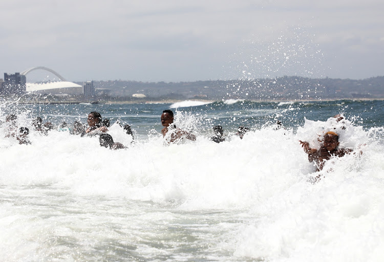 Holiday makers enjoying themselves at South beach in Durban.