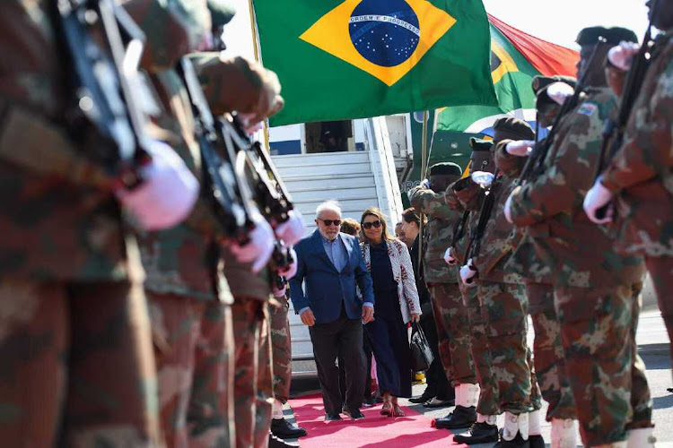 President of Brazil Luiz Inacio Lula da Silva and his wife, Rosangela, arrive in Johannesburg for the 15th Brics summit, August 21 2023. Picture: GETTY IMAGES