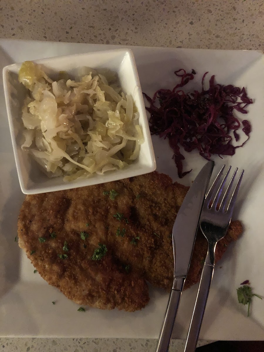 GF Schnitzel (prepared completely separately from the normal ones) with sauerkraut and red cabbage. Amazing!