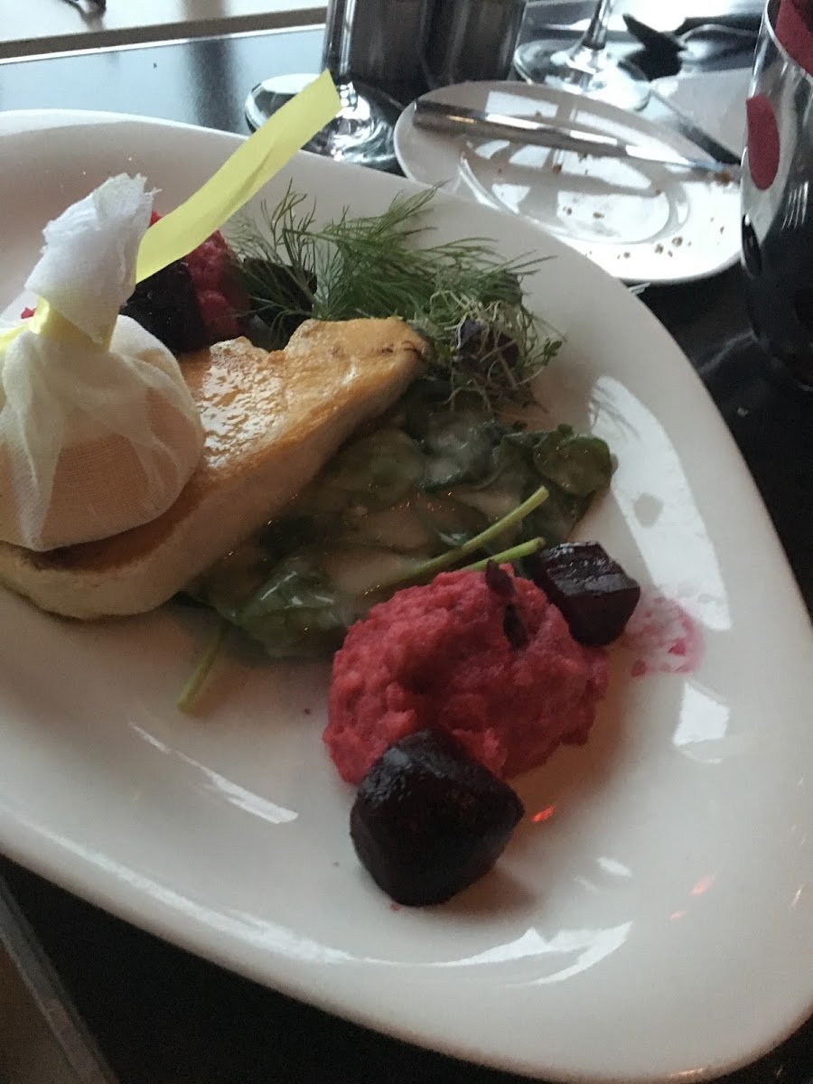 Fish with beet polenta and warm spinach salad