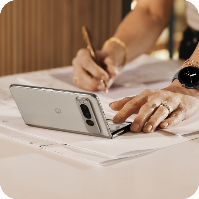 A woman working on her Google Pixel Fold.