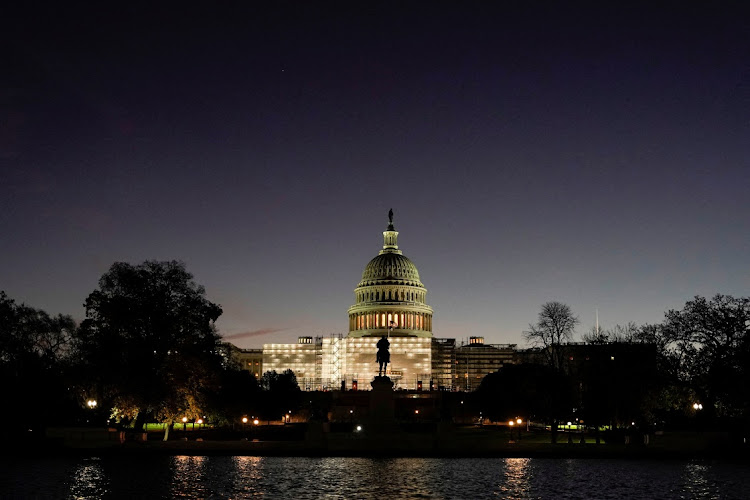 The sun rises at the U.S. Capitol on the morning of U.S. midterm elections in Washington, U.S., November 8, 2022. REUTERS/JOSHUA ROBERTS