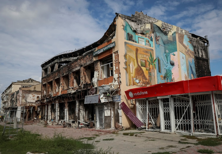 Damaged buildings in the town of Izium, which was recently liberated by Ukrainian Armed Forces, in Kharkiv region, Ukraine, September 17 2022. Picture: GLEB GARANICH/REUTERS