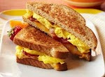 Bacon 'n' Egg Breakfast Grilled Cheese was pinched from <a href="http://www.mrfood.com/Eggs/Bacon-and-Egg-Breakfast-Grilled-Cheese/ct/1" target="_blank">www.mrfood.com.</a>