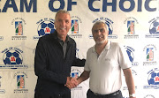 Maritzburg United chairman Farook Kadodia welcomes Ernst Middendorp, left, back to the club.