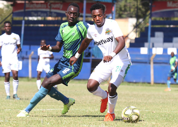 James Mazembe in action with Brian Ochieng in a previous match