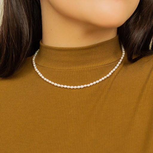 Title 6, Niche style oval shell pearl and pearl necklace...