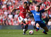 SHARP SHOOTER: Manchester United forward Anthony Martial scores the team's second goal during their Premier League match against Everton at Old Trafford on April 08, 2023 in Manchester, England.