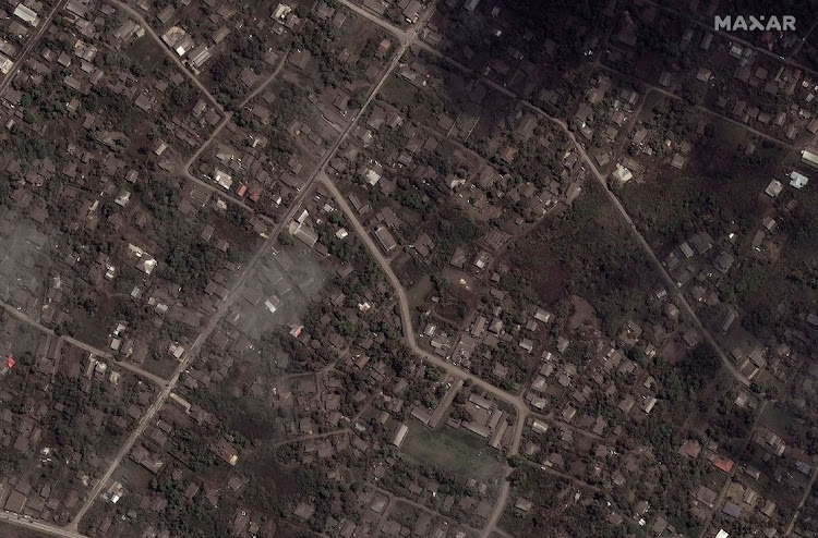 A satellite image shows ash covered homes and buildings after the main eruption of the Hunga Tonga-Hunga Ha'apai volcano, in Nuku'alofa, Tonga on January 18 2022. Picture: MAXAR TECHNOLOGIES via REUTERS