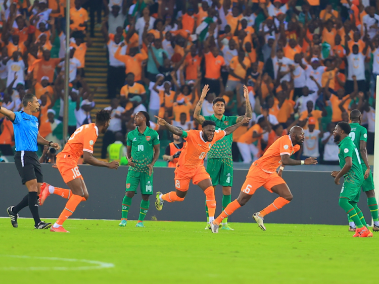 Hosts Ivory Coast celebrate after scoring against Guinea Bissau in their opening game of the Afcon.