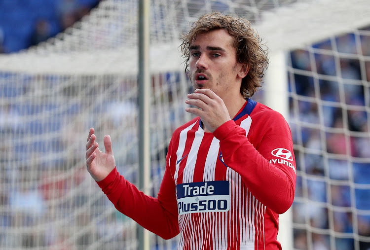 Atletico Madrid's Antoine Griezmann reacts after missing a chance to score. The French star who won the 2018 World Cup is on the wanted list of Spanish giants Barcelona.