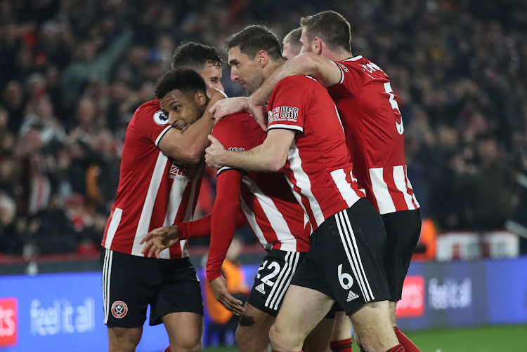 Sheffield United's Lys Mousset celebrates with teammates after scoring against Manchester United on Sunday