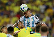 Argentina's Nicolas Otamendi gets up to head their first goal in the 2026 World Cup qualifier against Brazil at Estadio Maracana in Rio de Janeiro, Brazil on Tuesday night.