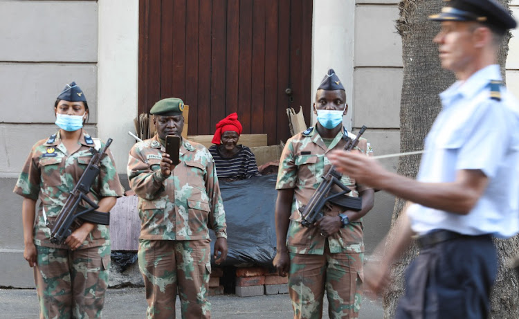 A homeless lady looks on during the final rehearsal preparations are underway for tomorrow’s State of the Nation Address at Cape Town City Hall. Pic: ESA ALEXANDER