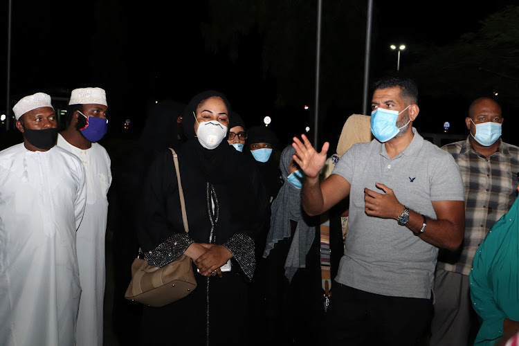 Mvita MP Abdulswamad Nassir talks to parents of the students at the Moi International Airport in Mombasa on Saturday evening.