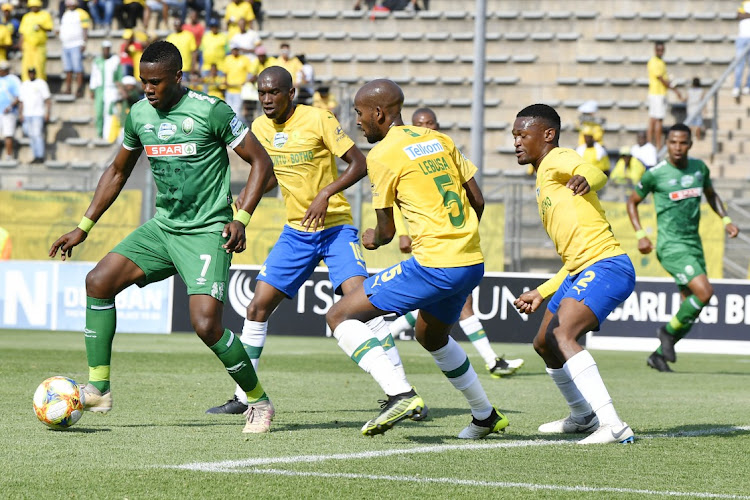 Bonginkosi Ntuli of AmaZulu is challenge by Motjeka Madisha,Mosa Lebusa and Anele Ngcongca of Mamelodi Sundowns during their Telkom Knockout Last 16 match played at Lucas Moripe Stadium in Pretoria on Sunday.