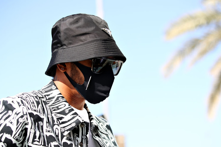 Lewis Hamilton of Great Britain and Mercedes GP arrives at the circuit before practice ahead of the F1 Grand Prix of Abu Dhabi at Yas Marina Circuit on December 11 2020 in Abu Dhabi.