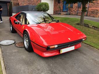 Alarm on ferrari 308 album cover