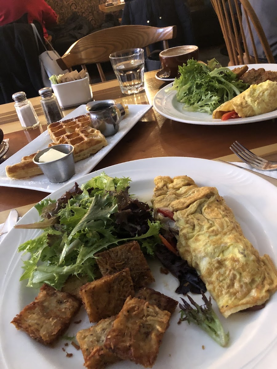 Belgian Waffle and potato latkes and omelette. Completely gluten free and SO totally amazing.