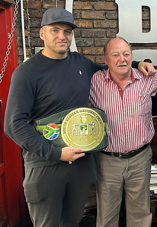 Newly crowned SA heavyweight champ Shaun Potgieter with Justin Wright from Isuzu.