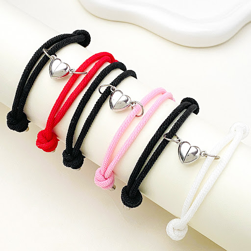 Title 1, Hand-holding hand-knitted rope lovers bracelet ...