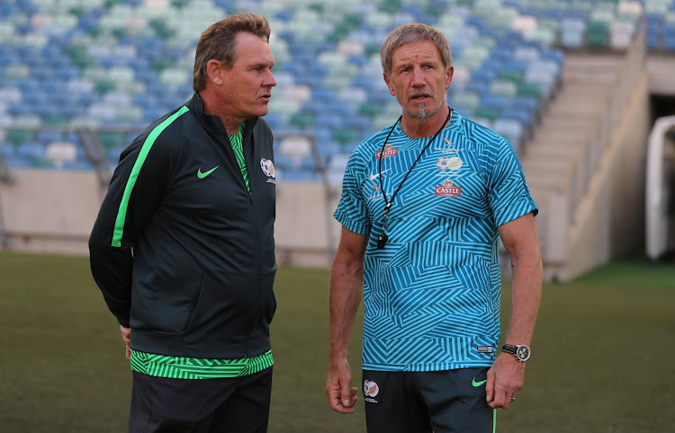 The SA Football Association technical director Neil Tovey (L) in a discussion with the national team head coach, Bafana Bafana, Stuart Baxter.