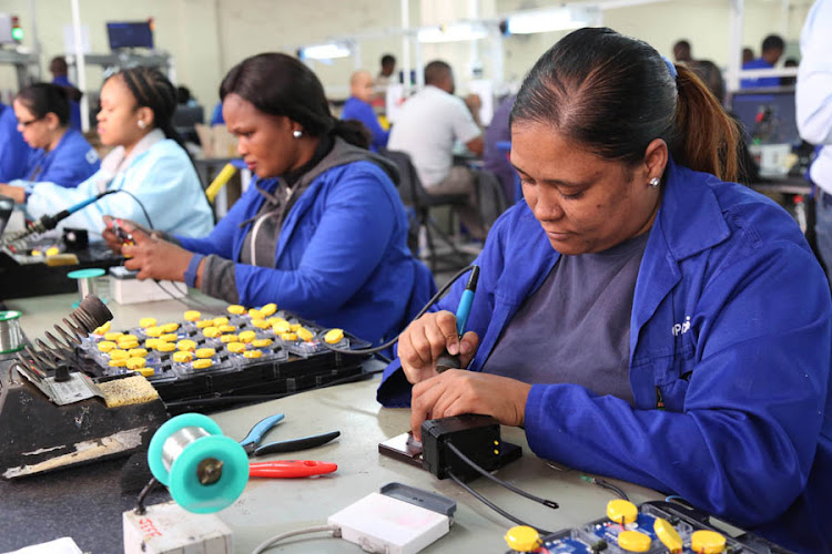 Raquel Wiseman, Daphnie Xolo and Xoliswa Majola in the final assembly area of Utility Systems, which manufactures water management devises that are being supplied throughout the country.