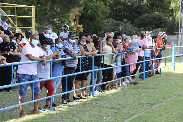 Parents gather for a meeting with Panyaza Lesufi at Hoërskool Jan Viljoen on Sunday.