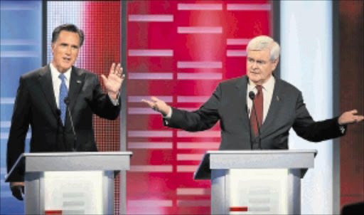 CONTENDERS: Newt Gingrich, right, with Mitt Romney