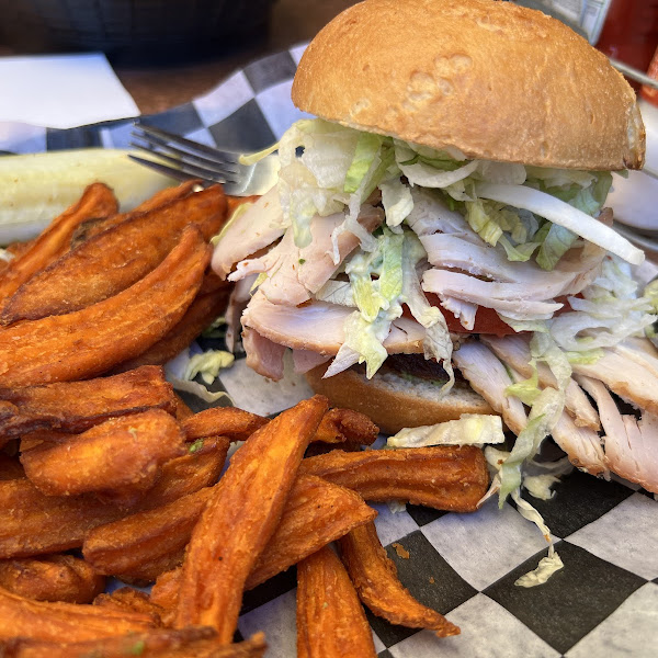 Turkey avocado bacon sandwhich and shared fryer sweet potato fries