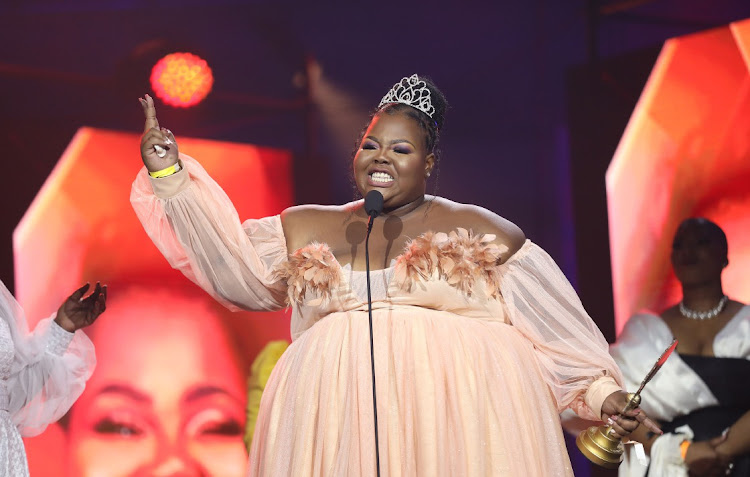 Phumla Music with her trophy from the first Basadi in Music Awards in Midrand last week. She also has two degrees in media studies and comminications.