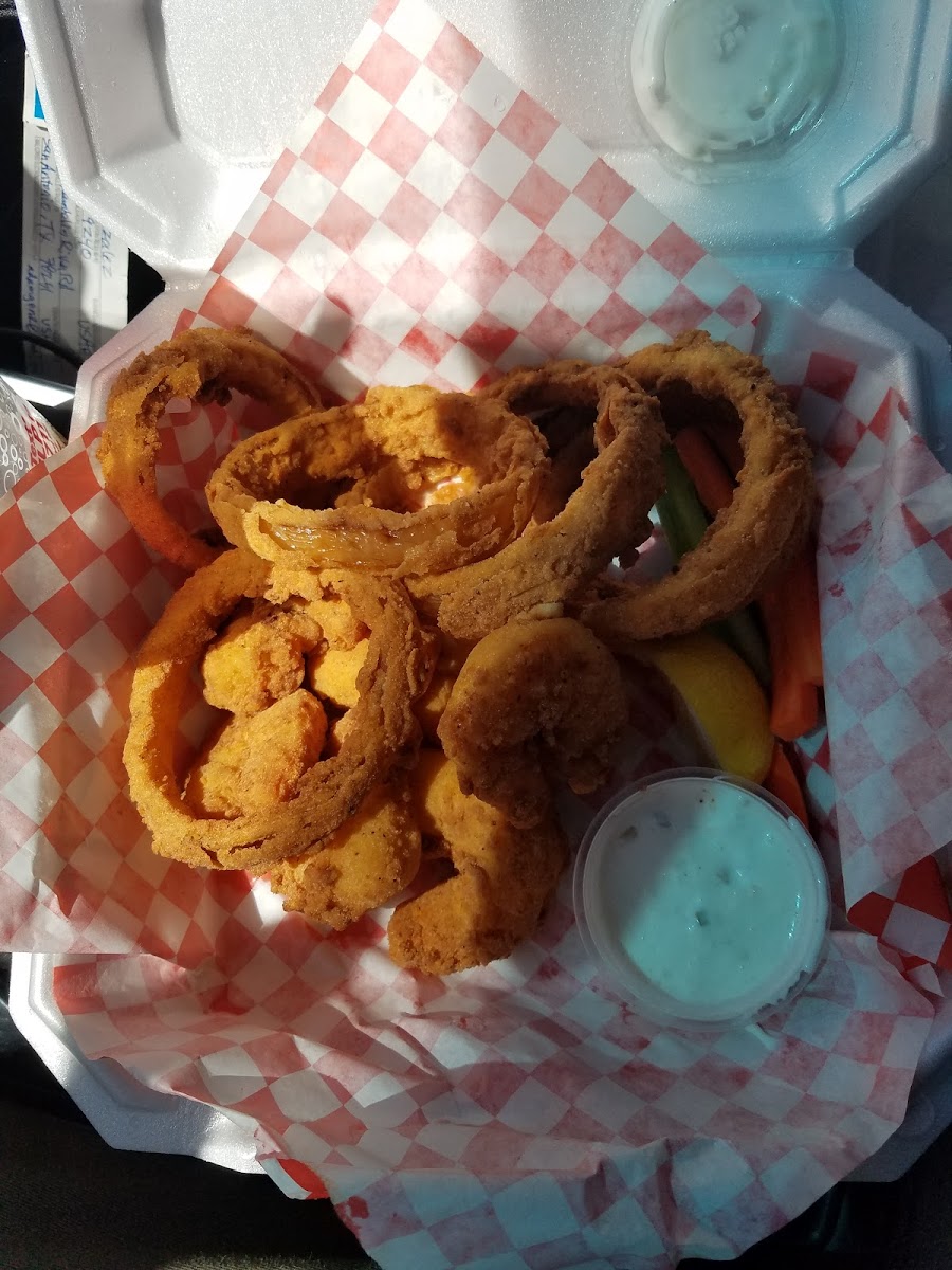 Fried jumbo shrimp and onion rings.