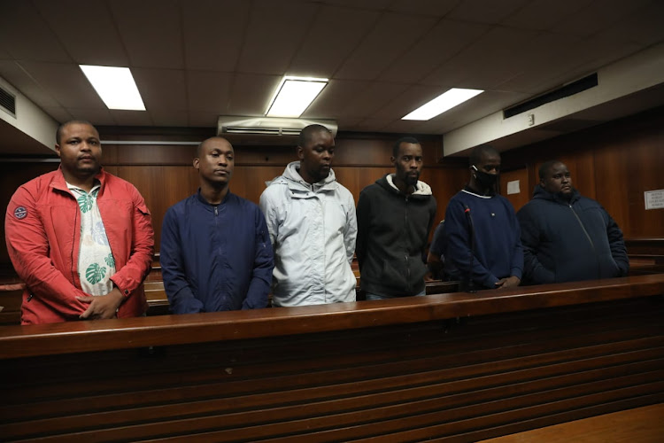 Mlungisi Thabathe, 28, Andile Nhleko, 27, Mncedisi Mzobe, 27, Siyanda Msweli, 26, Lindani Ndlovu, 22, and Malusi Mthembu, 27, are charged with the murder and kidnapping of Andile Mbuthu.