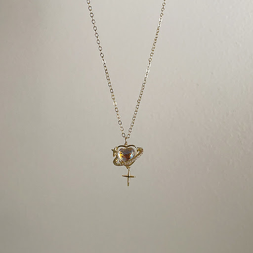 Title 2, Opal Love Heart Asterism Pendant Necklace. A pe...