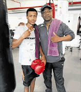 Kholisile Cengani, right, with IBO champ Ayanda Ndulani.