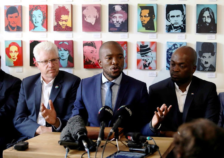 DA leader Mmusi Maimane in Cape Town on April 23 2019 with the party's Western Cape and Gauteng premier candidates, Alan Winde and Solly Msimang.